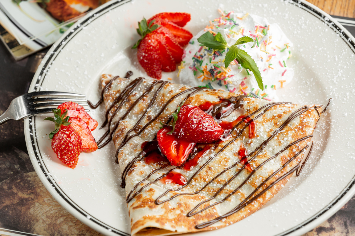 Sweet Crepe with Strawberries and Cream